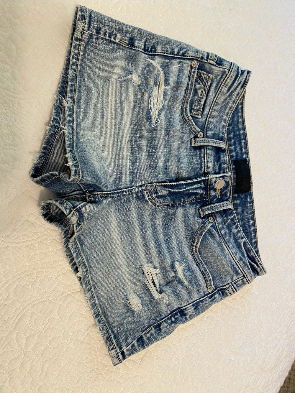 Buckle Light Blue Distressed Denim Shorts